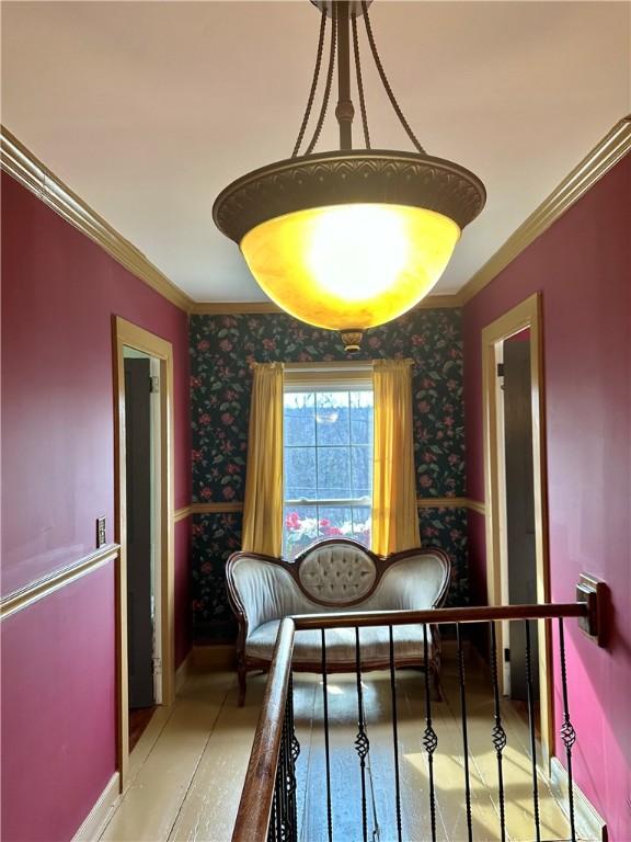 5166 State Highway 41, Smithville, NY 13778 - dining space featuring baseboards, wallpapered walls, and crown molding