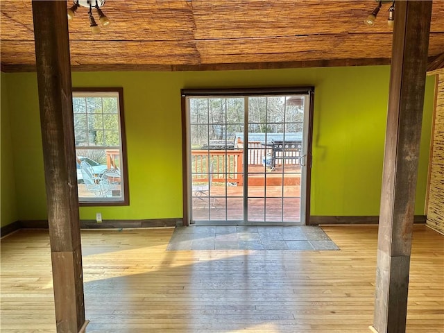 5166 State Highway 41, Smithville, NY 13778 - empty room with baseboards, wood ceiling, and wood-type flooring