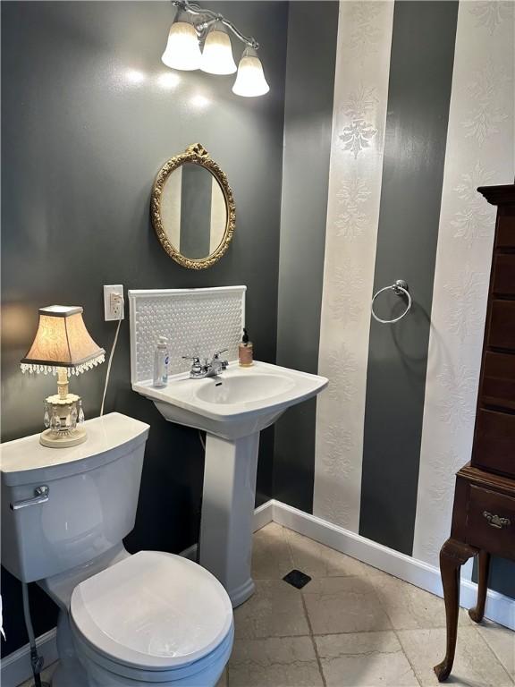 5166 State Highway 41, Smithville, NY 13778 - bathroom featuring toilet and baseboards