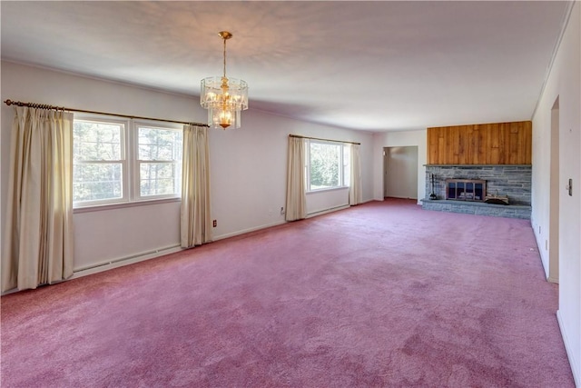 unfurnished living room with a fireplace, baseboard heating, baseboards, carpet, and an inviting chandelier