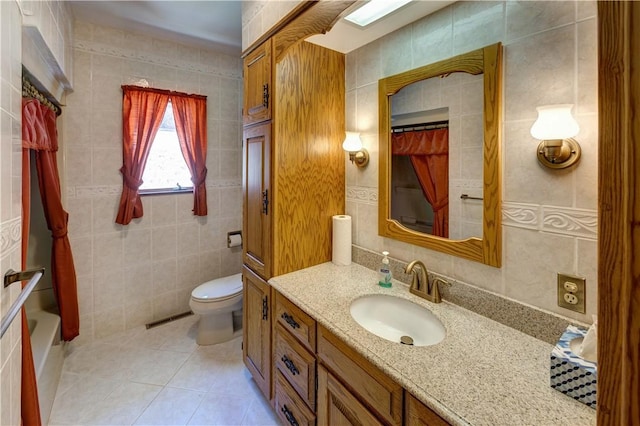 full bathroom featuring tile walls and toilet