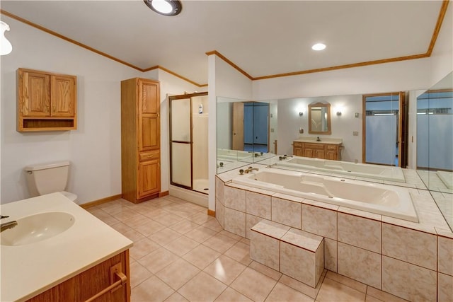 full bathroom featuring a stall shower, tile patterned floors, crown molding, a sink, and a bath