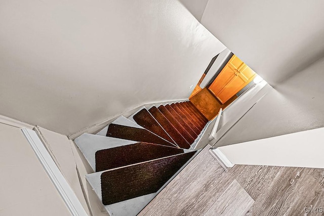 1002 N Madison St, Rome-Inside, NY 13440 - stairway featuring lofted ceiling