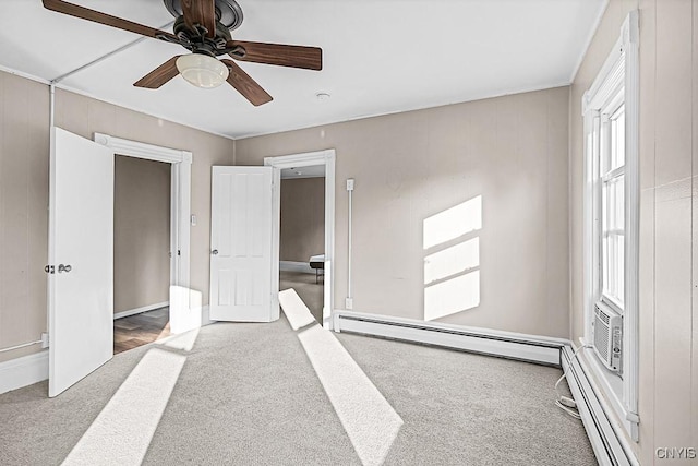 1002 N Madison St, Rome-Inside, NY 13440 - unfurnished bedroom with ceiling fan, a baseboard heating unit, and carpet