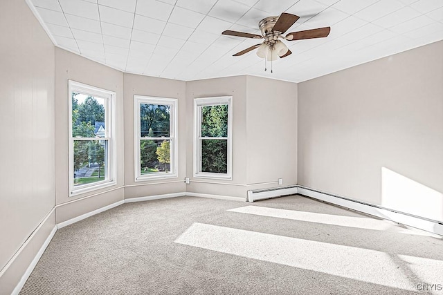 1002 N Madison St, Rome-Inside, NY 13440 - empty room featuring carpet flooring, a ceiling fan, and baseboards