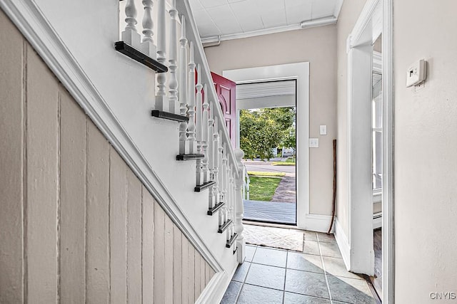 1002 N Madison St, Rome-Inside, NY 13440 - foyer entrance with plenty of natural light, crown molding, and stairway