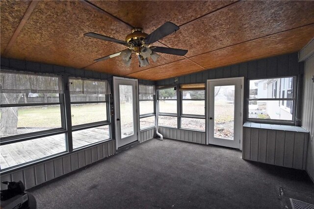 21 Algonquin Dr, Big Flats, NY 14845 - unfurnished sunroom with lofted ceiling and a ceiling fan