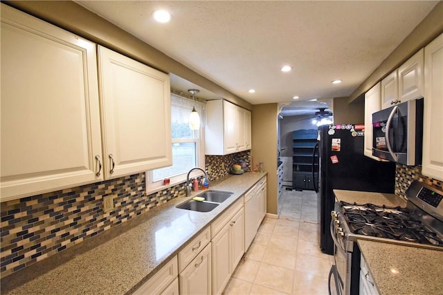 21 Algonquin Dr, Big Flats, NY 14845 - kitchen featuring appliances with stainless steel finishes, decorative backsplash, recessed lighting, light stone counters, and light tile patterned floors