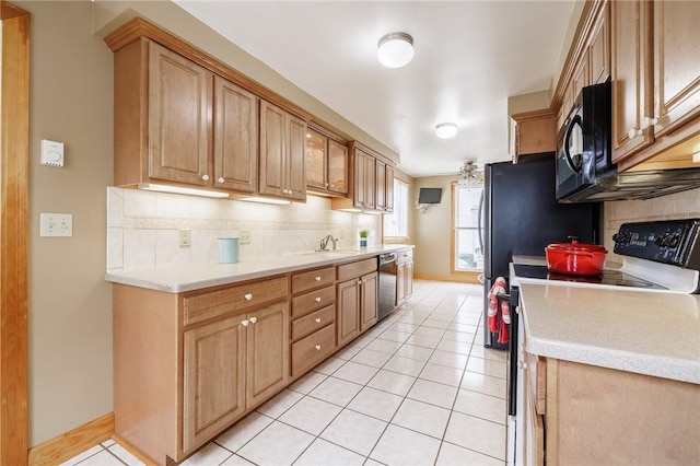 kitchen with black microwave, dishwashing machine, backsplash, and electric range