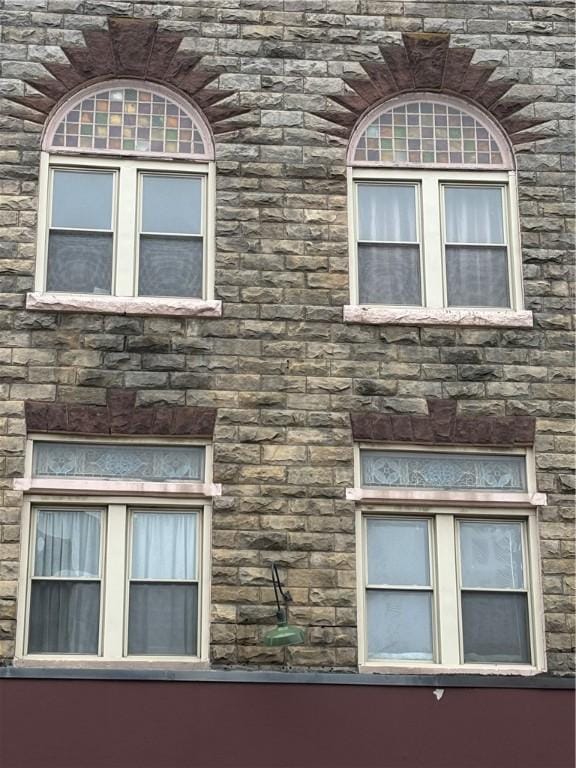 view of home's exterior with stone siding