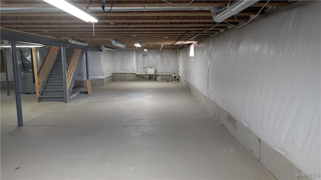 unfinished basement with stairs