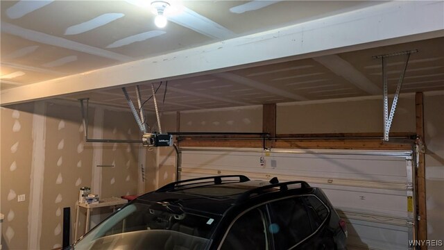 garage featuring a garage door opener