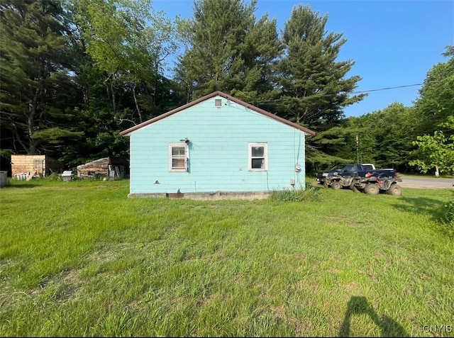 411 Emmonsburg Rd, Salisbury, NY 13454 - view of side of property with a lawn