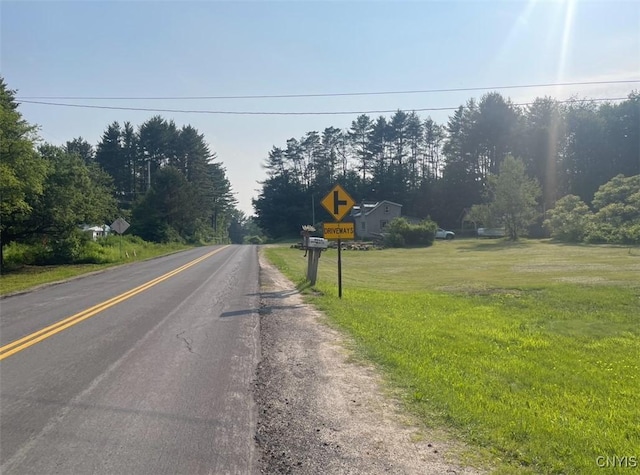 411 Emmonsburg Rd, Salisbury, NY 13454 - view of asphalt road with traffic signs