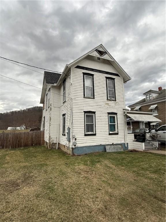 39 Steuben St, Addison, NY 14801 - view of home's exterior with roof with shingles, fence, and a lawn