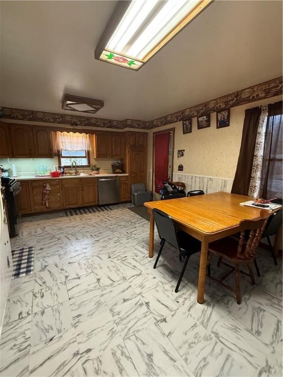39 Steuben St, Addison, NY 14801 - dining area featuring marble finish floor, wallpapered walls, vaulted ceiling, and wainscoting