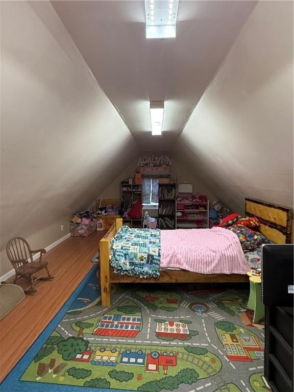 39 Steuben St, Addison, NY 14801 - bedroom with baseboards, vaulted ceiling, and wood finished floors