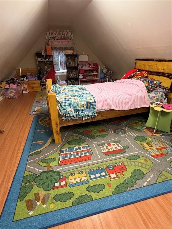 39 Steuben St, Addison, NY 14801 - bedroom featuring lofted ceiling and wood finished floors