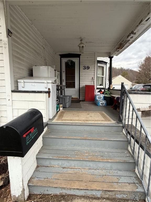 39 Steuben St, Addison, NY 14801 - view of exterior entry with covered porch