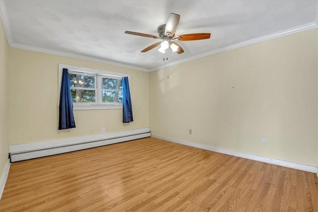empty room featuring crown molding, baseboards, ceiling fan, wood finished floors, and baseboard heating