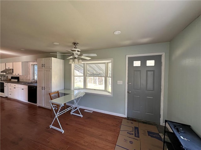 5187 State Highway 23, Norwich-Town, NY 13815 - foyer entrance featuring dark wood-type flooring, baseboards, and ceiling fan