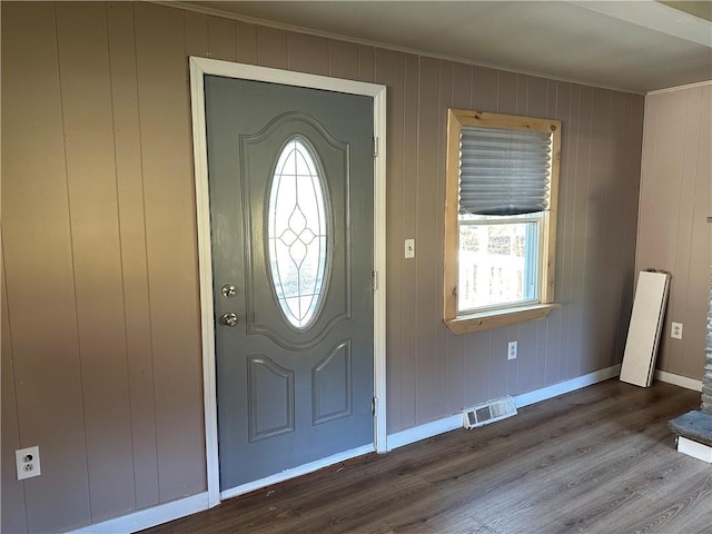 5187 State Highway 23, Norwich-Town, NY 13815 - entrance foyer featuring wood finished floors, crown molding, baseboards, and visible vents