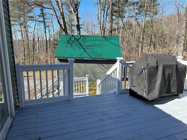 5187 State Highway 23, Norwich-Town, NY 13815 - wooden terrace featuring a view of trees and a grill