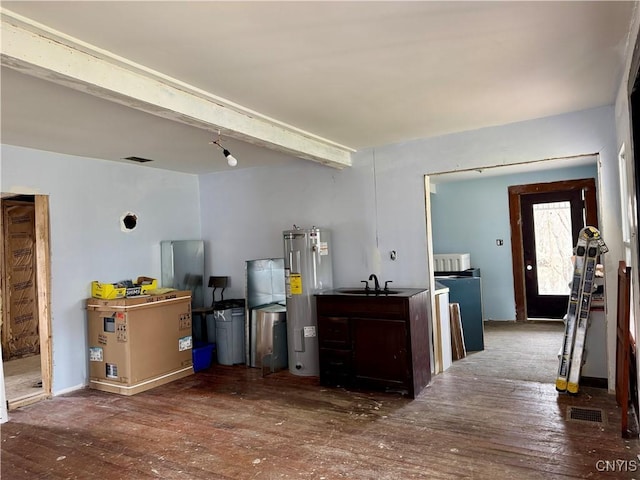 59 State Route 200, Harford, NY 13835 - interior space featuring water heater, beam ceiling, a sink, wood-type flooring, and visible vents