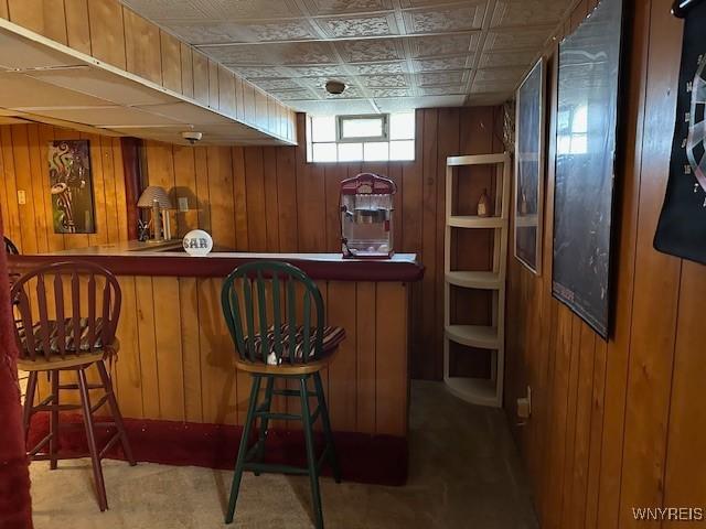 bar with a bar and wooden walls