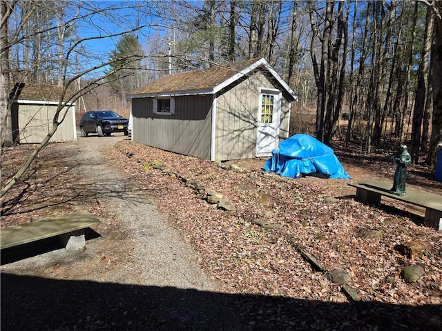 476 Musson Erwin Rd, Butternuts, NY 13843 - view of shed featuring dirt driveway