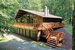 1538 Caton Rd, Caton, NY 14830 - exterior space with a wooden deck and a forest view