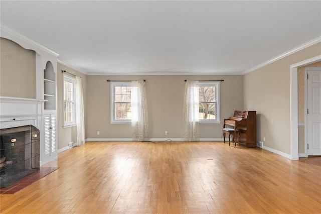 507 Hilltop Rd, Union, NY 13760 - unfurnished living room with a wealth of natural light, a fireplace with flush hearth, and light wood-type flooring