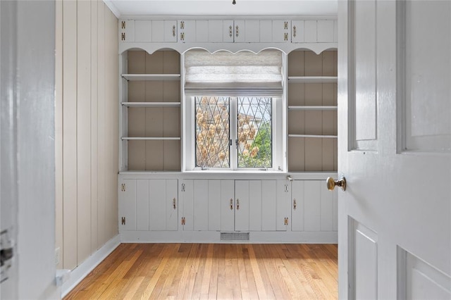 507 Hilltop Rd, Union, NY 13760 - interior space featuring hardwood / wood-style floors, built in shelves, and visible vents
