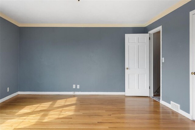507 Hilltop Rd, Union, NY 13760 - spare room featuring baseboards, visible vents, crown molding, and light wood-style flooring