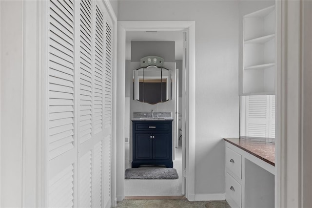 507 Hilltop Rd, Union, NY 13760 - bathroom featuring vanity, baseboards, and built in shelves