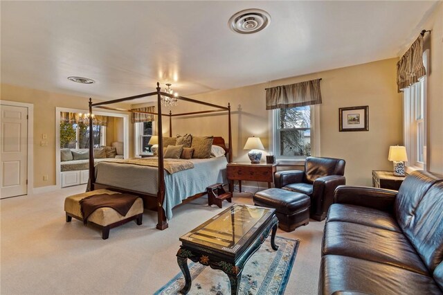 4508 State Route 64, Bristol, NY 14424 - bedroom with an inviting chandelier, carpet, and visible vents