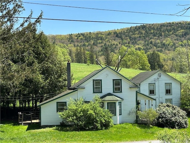 1114 Bull Run Rd, Middletown, NY 12455 - rear view of property with a view of trees and a yard