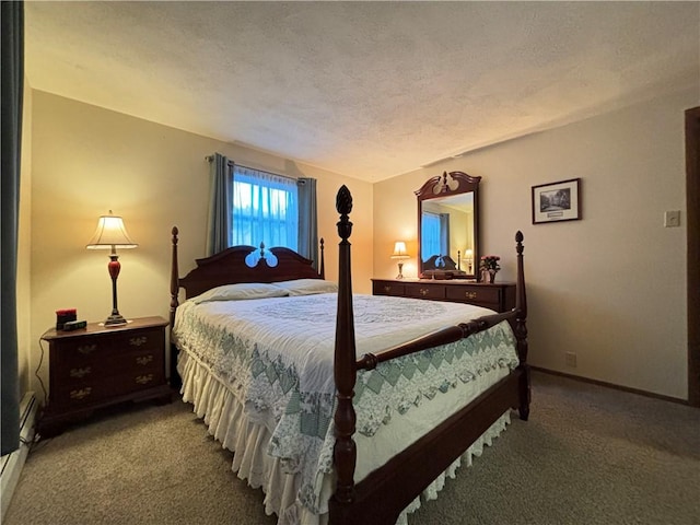 bedroom featuring baseboards, carpet flooring, and a textured ceiling