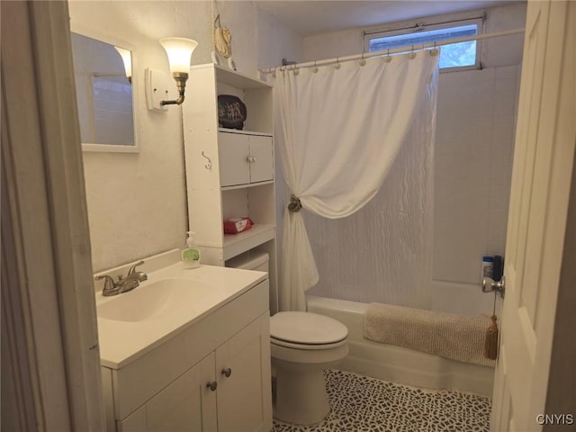 bathroom with toilet, vanity, and shower / bathtub combination with curtain