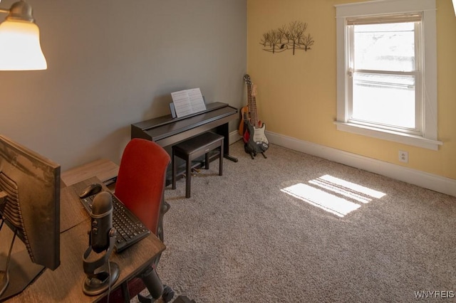interior space with a wealth of natural light, carpet flooring, and baseboards