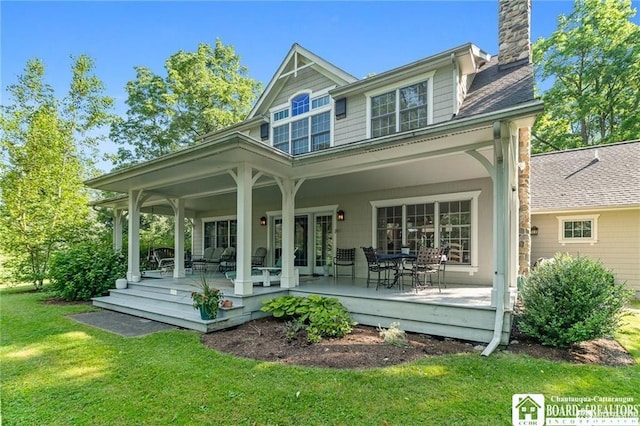 2401/2 Lakeside Dr, Ellery, NY 14712 - back of house featuring french doors, a lawn, and a chimney