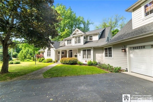 2401/2 Lakeside Dr, Ellery, NY 14712 - view of front of property with a shingled roof, aphalt driveway, a front yard, and a garage