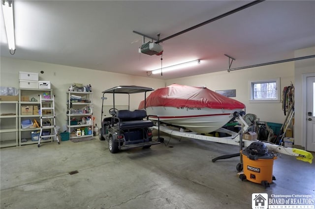 2401/2 Lakeside Dr, Ellery, NY 14712 - garage featuring a garage door opener
