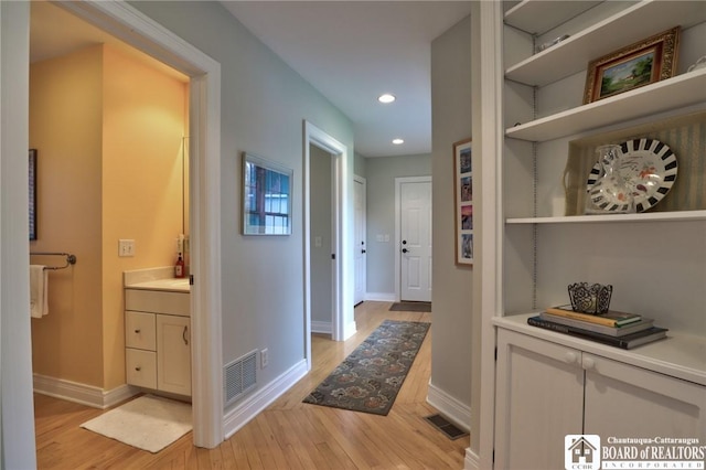 2401/2 Lakeside Dr, Ellery, NY 14712 - corridor with recessed lighting, light wood finished floors, visible vents, and baseboards