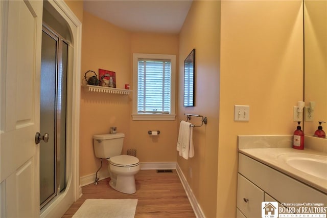 2401/2 Lakeside Dr, Ellery, NY 14712 - bathroom with a shower stall, vanity, visible vents, and wood finished floors
