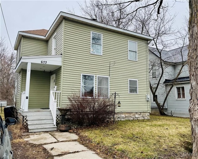 673 Cooper St, Watertown-City, NY 13601 - exterior space featuring a front lawn and a porch