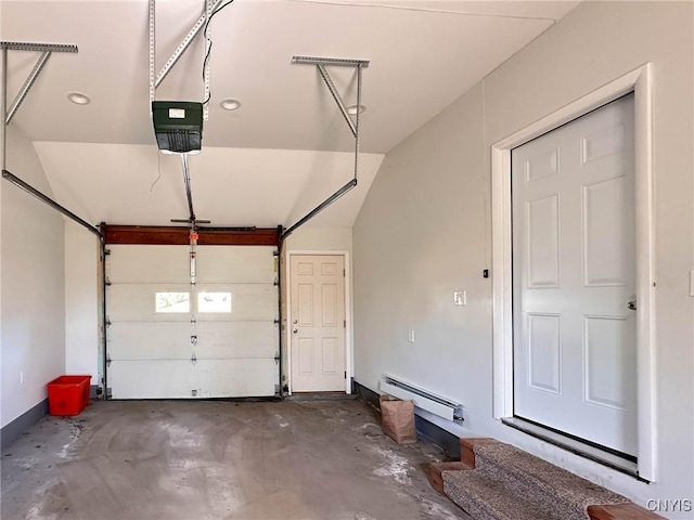 garage featuring a baseboard radiator and a garage door opener