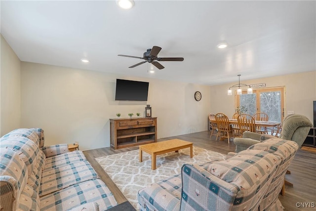 living area with recessed lighting, ceiling fan, and wood finished floors