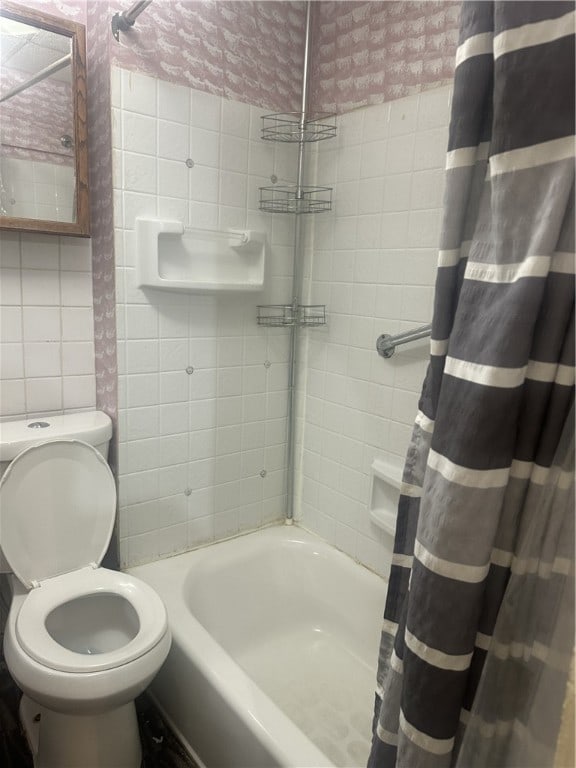 344 Tremont St, Rochester, NY 14608 - bathroom with tile walls and shower / tub combo