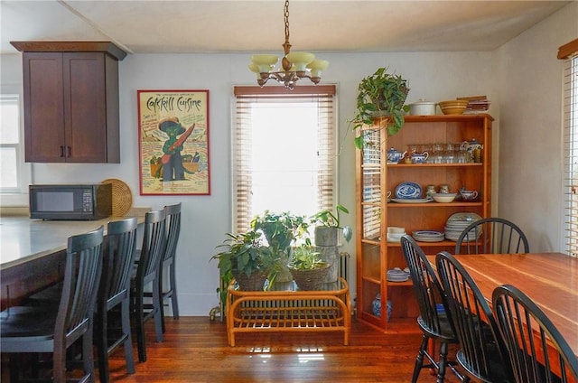 265 Main St, Delhi, NY 13753 - dining area with wood finished floors and an inviting chandelier